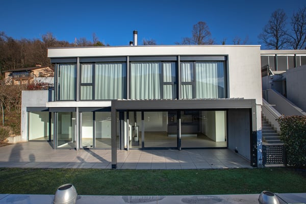 Oasi di prestigio a 10 minuti dal centro di Lugano: Moderno 3.5 locali con ampio giardino 7
