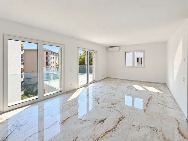 Affittasi moderno 4.5 locali in zona residenziale 1