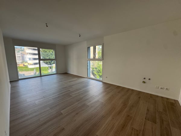 UFFICI fronte strada - in Nuova Residenza a Pregassona - Lusso Moderno e Comodità - posto auto 15