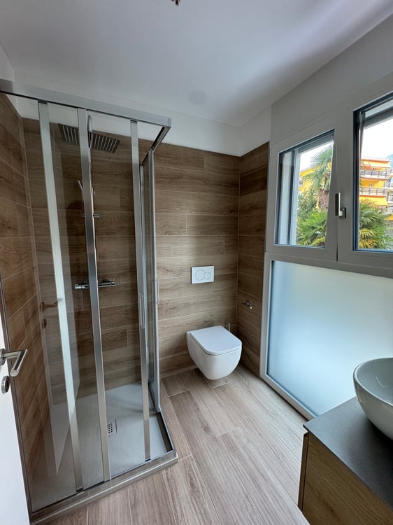 UFFICI fronte strada - in Nuova Residenza a Pregassona - Lusso Moderno e Comodità - posto auto 18