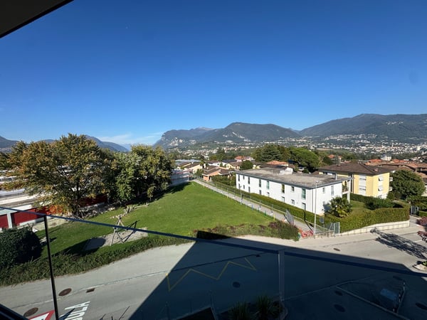 Novazzano – Attico moderno con terrazzi panoramici e finiture di alto standing 1