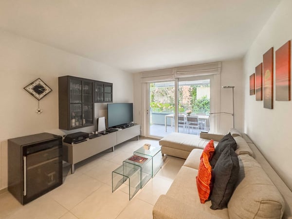 PER REDDITO O USO PRIVATO recentissimo elegante 2.5 locali con giardino privato 3