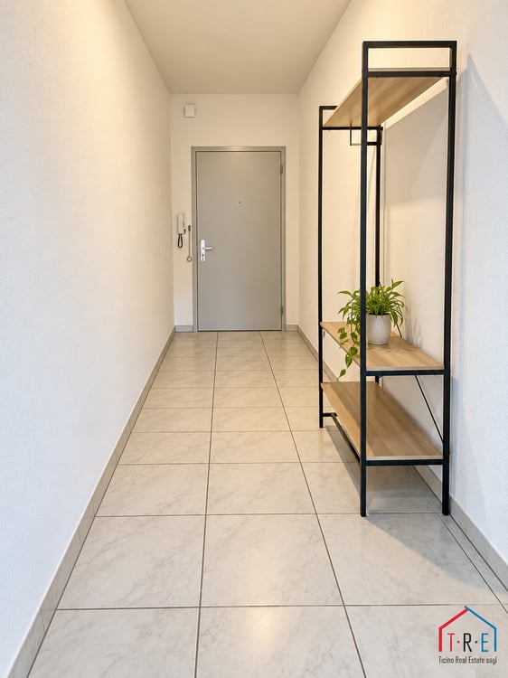MENDRISIO – LUMINOSO APPARTAMENTO DI 2.5 LOCALI CON BALCONE, ASCENSORE E POSTO AUTO 12