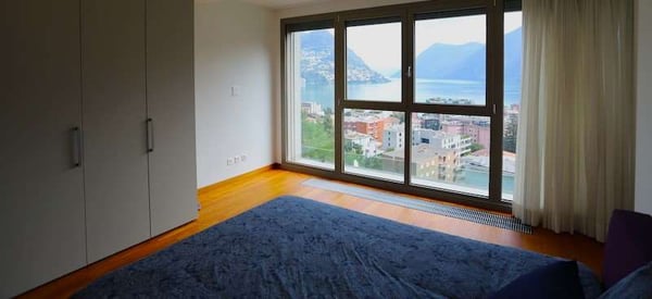 ATTICO CON TERRAZZO CON VISTA LAGO 7