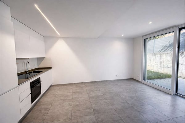 2,5 locali con giardino - Carabbia 4
