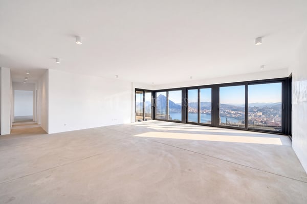 Nuovo spazioso appartamento 4,5 con vista lago e giardino 1