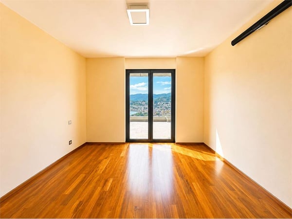Esclusivo Attico con Roof Garden e Vista Panoramica sul Lago di Lugano 8
