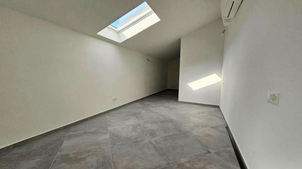 APPARTAMENTO MANSARDATO A CAPOLAGO 8