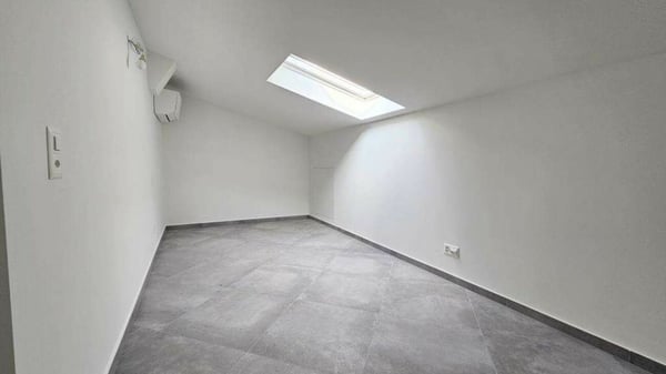 APPARTAMENTO MANSARDATO A CAPOLAGO 7