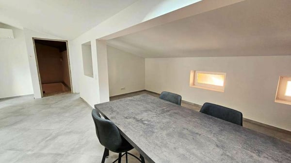 APPARTAMENTO MANSARDATO A CAPOLAGO 6