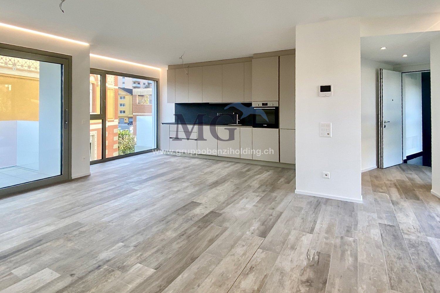 wooden floor, glass doors, sliding windows, kitchen with appliances