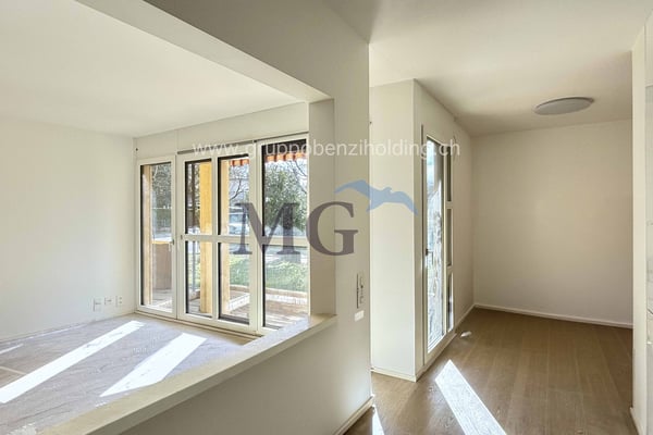 Appartamento di 3.5 locali in zona residenziale e con giardino privato 1