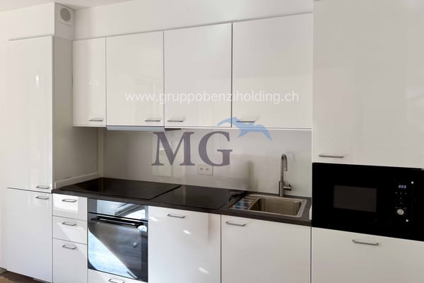 Appartamento di 3.5 locali in zona residenziale e con giardino privato 10