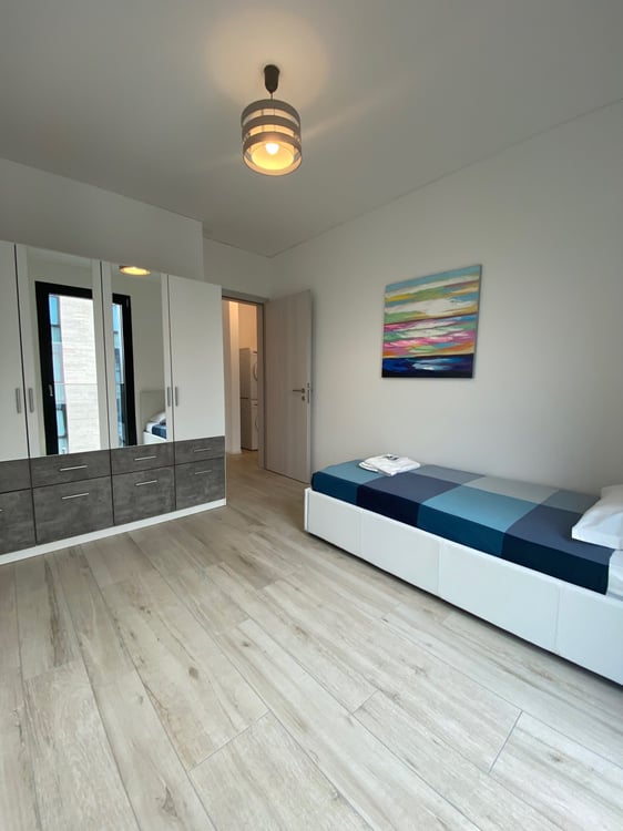 ELEGANTE 3.5 LOCALI ARREDATO CON PARCHEGGIO PRIVATO 9