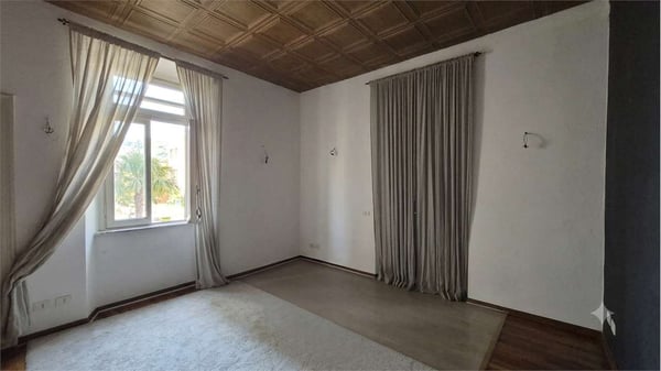 Casa indipendente con ampio giardino edificabile nel cuore di Chiasso 8