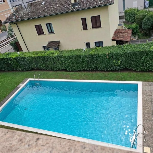 Luminoso 4.5 locali ad Agno con piscina condominiale e giardino 13