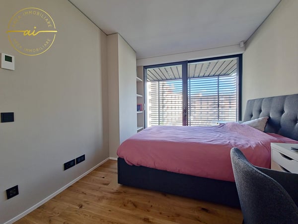 RAFFINATO APPARTAMENTO DI 1.5 LOCALI CON TERRAZZA E VISTA LAGO PARZIALE A PARADISO 18