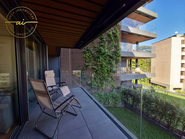 RAFFINATO APPARTAMENTO DI 1.5 LOCALI CON TERRAZZA E VISTA LAGO PARZIALE A PARADISO 2