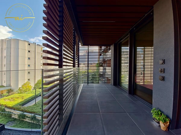 RAFFINATO APPARTAMENTO DI 1.5 LOCALI CON TERRAZZA E VISTA LAGO PARZIALE A PARADISO 8