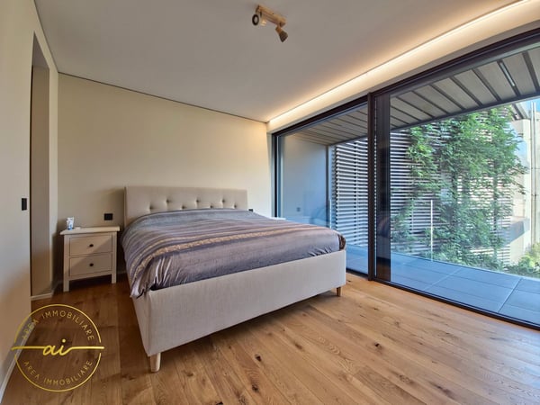 RAFFINATO APPARTAMENTO DI 1.5 LOCALI CON TERRAZZA E VISTA LAGO PARZIALE A PARADISO 14