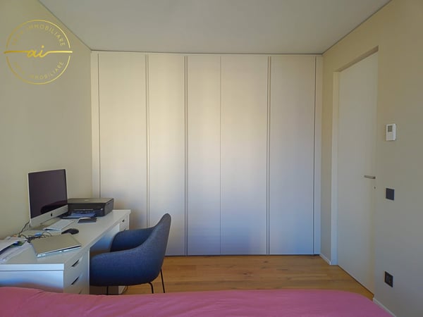 RAFFINATO APPARTAMENTO DI 1.5 LOCALI CON TERRAZZA E VISTA LAGO PARZIALE A PARADISO 15