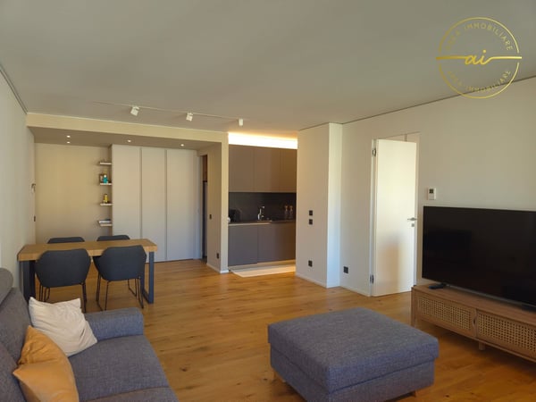 RAFFINATO APPARTAMENTO DI 1.5 LOCALI CON TERRAZZA E VISTA LAGO PARZIALE A PARADISO 7