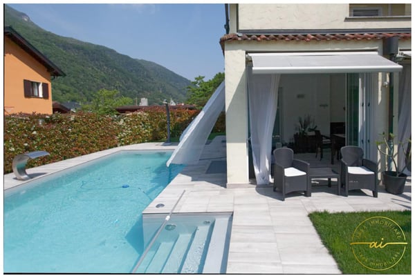 Elegante villa unifamiliare con piscina e ampio giardino a Riva San Vitale 3