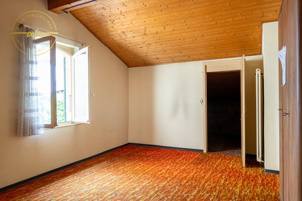 Casa unifamiliare con locale commerciale annesso 25