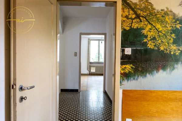 Casa unifamiliare con locale commerciale annesso 21