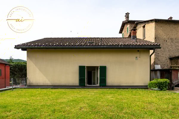 Casa unifamiliare con locale commerciale annesso 5