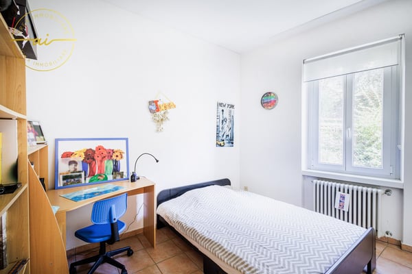 AMPIA CASA DI 1.5 LOCALI IN ZONA RESIDENZIALE A MORBIO INFERIORE 12