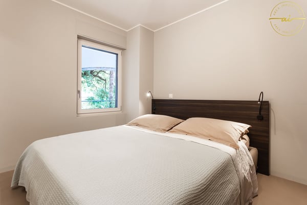 ESCLUSIVO 2.5 LOCALI VISTA LAGO CON GIARDINO E TERRAZZA 15