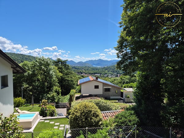 ESCLUSIVO 4.5 LOCALI CON GIARDINO E VISTA PANORAMICA A SALA CAPRIASCA 3