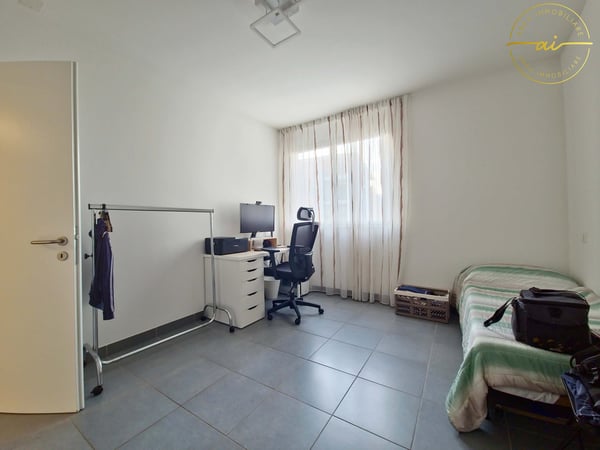 LUMINOSO APPARTAMENTO DI 3.5 LOCALI CON VISTA APERTA A PREGASSONA 12