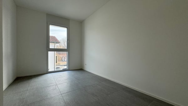 Elegante appartamento 3.5 locali con terrazza in nuova residenza 9