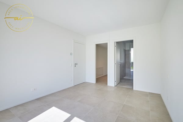 ELEGANTE 2.5 LOCALI DI NUOVA COSTRUZIONE CON GIARDINO 9