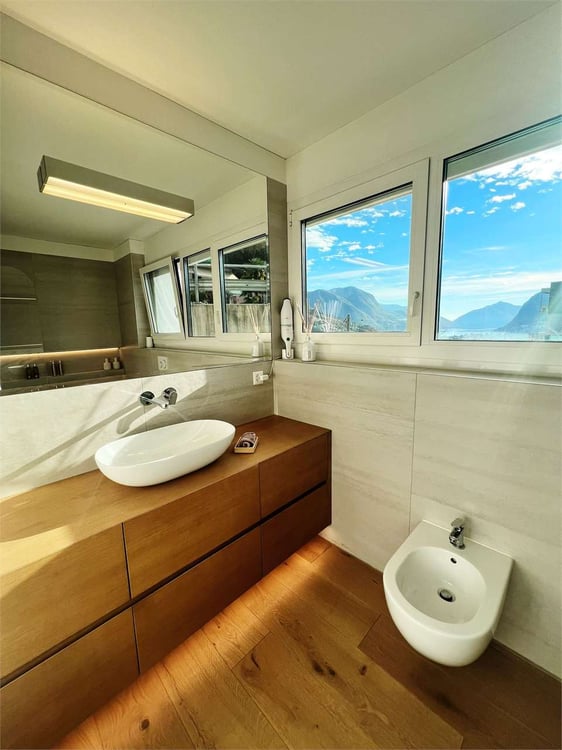 Elegante 3,5 locali arredato con giardino e vista lago 6