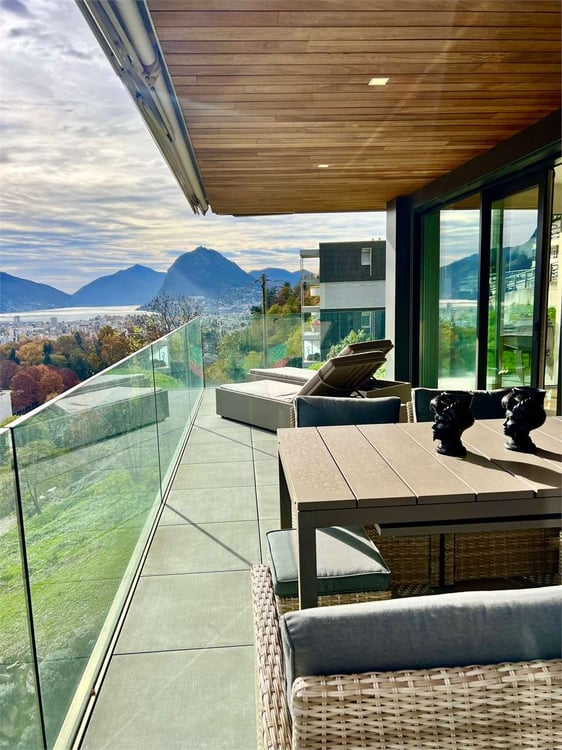 Elegante 3,5 locali arredato con giardino e vista lago 13