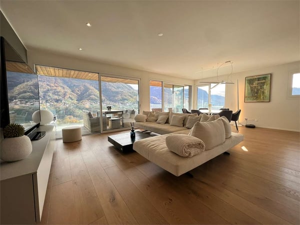 Elegante 3,5 locali arredato con giardino e vista lago 1