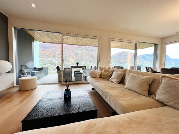 Elegante 3,5 locali arredato con giardino e vista lago 2