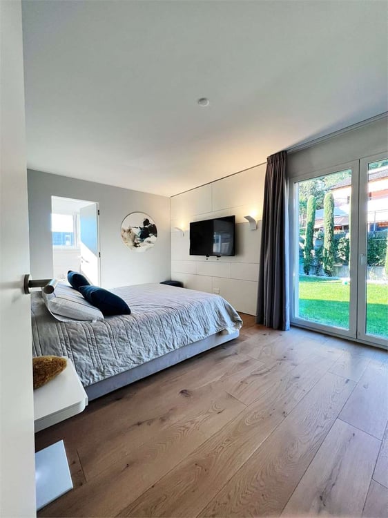 Elegante 3,5 locali arredato con giardino e vista lago 5