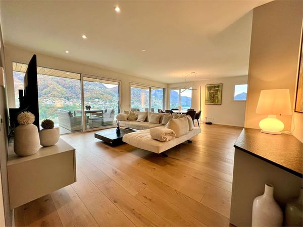 Elegante 3,5 locali arredato con giardino e vista lago 11