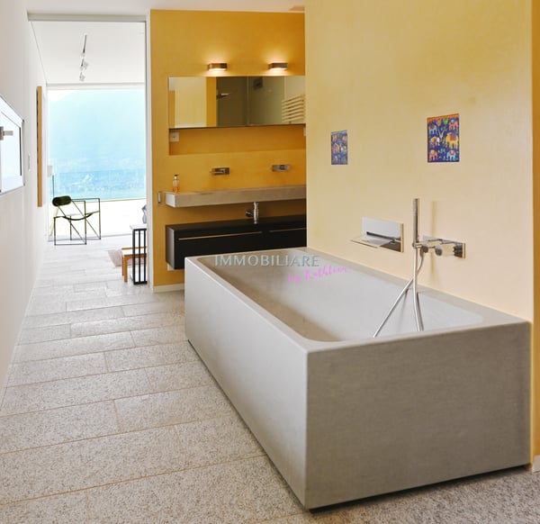 Villa mit Sichtbeton, Panoramaseeblick und nachhaltiger Ausstattung 9