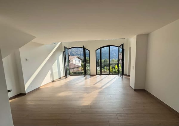 Elegante Duplex di 1.5 Locali con Vista Panoramica a Barbengo 1