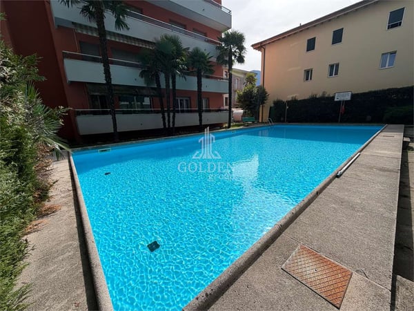 3,5 locali con ampia terrazza e piscina in posizione centrale a Lugano 1