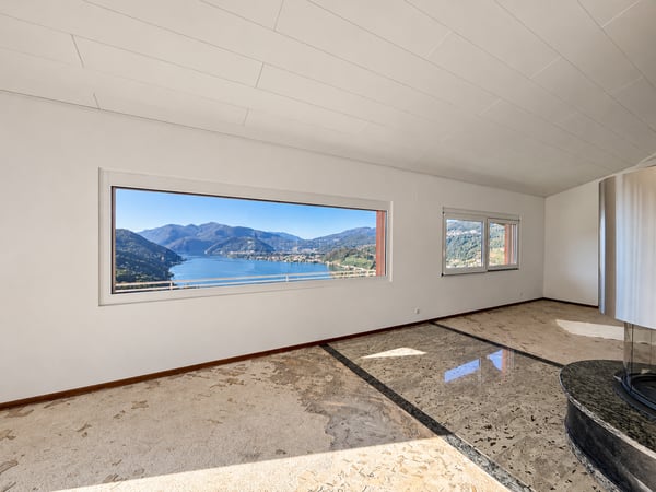 Elegante villa con vista panoramica sul lago, piscina a sfioro e giardino privato 13