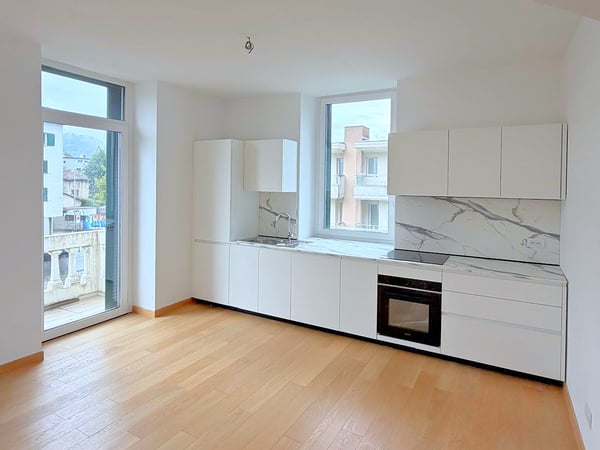Magliaso – Elegante 3,5 locali immerso nel verde con balcone e posteggio