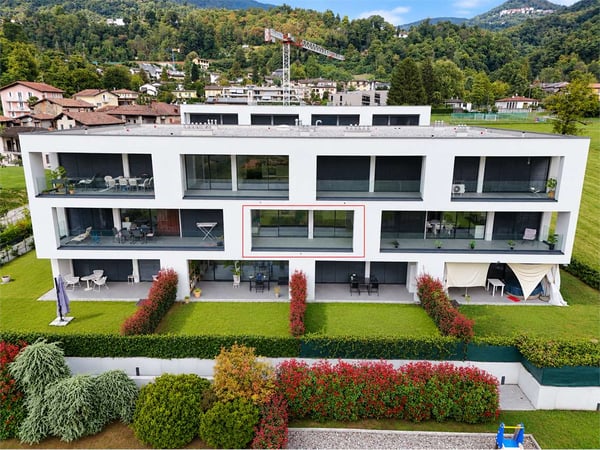 Moderno appartamento 2.5 locali con terrazza nella Residenza Due Laghi