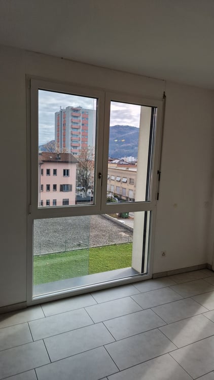 Moderno appartamento 2.5 locali con balcone e vista aperta 13