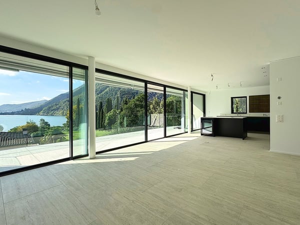 Elegante 1.5 locali al primo piano con terrazza e parziale vista lago 3